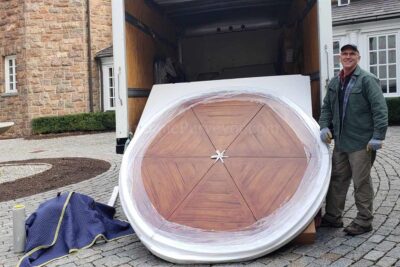 Large Jupe table being delivered into Brookrace Manor estate in Mendham, NJ