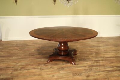 Mahogany jupe table shown opened to 70 inches round