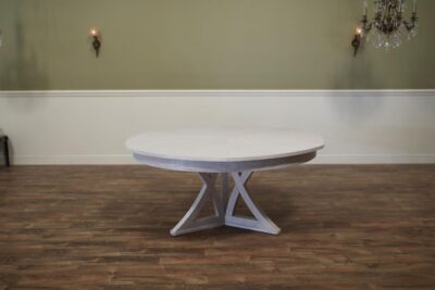 Casual Jupe table with Whitewash finish, 64 to 84 inches round and seats 6 to 10 people