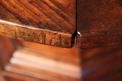 Rough cut corners add to the tables distressed look