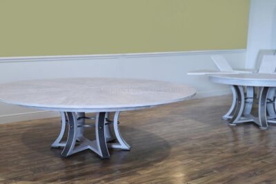 We offer this model Jupe in two sizes, the table shown in background is a smaller size