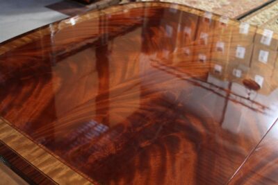 Standard finish mahogany dining table with glossy sheen