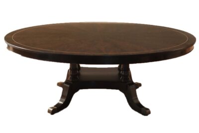 Dark 84-inch round mahogany dining table