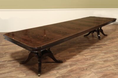 Table shown in walnut finish, and with upgraded pedestals