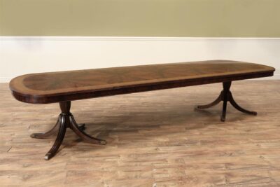 Duncan Phyfe Double Pedestal Dining Room table with Leaves Opens to 12 Feet and Seats 14