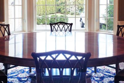 84 inch round mahogany dining table shown in Connecticut estate