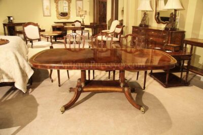 Luxurious mahogany dining table with intricately inlaid border and base