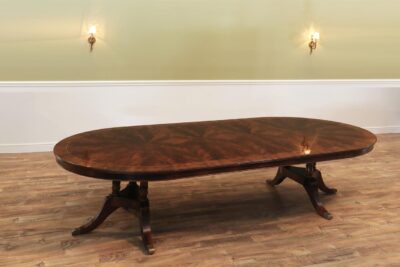 60 round mahogany dining table with leaves, seats 10 to 12 people