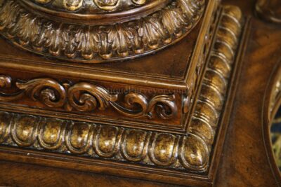 Brass colored gold accented pedestal table