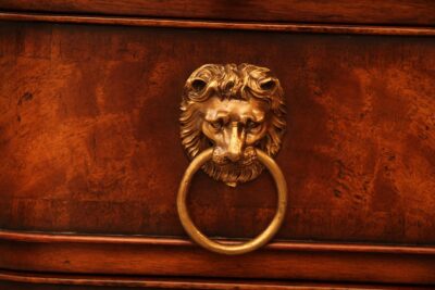 Finely cast lion mask and drop handle drawer pulls