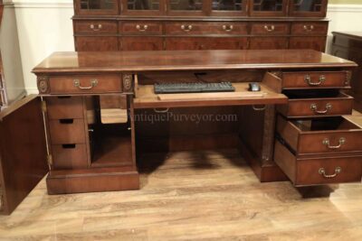 High-end mahogany credenza with mainframe storage, keyboard drawer and nested nicknack storage