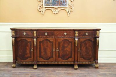 18th century reproduction mahogany sideboard shown with gold gilded accents