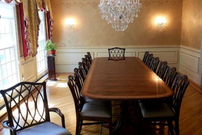 Chippendale chairs shown here around an 84 inch round table