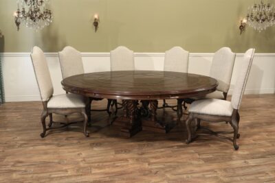 Camel back chairs shown here with a large round dining table