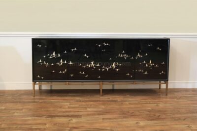 Black glass credenza with reverse painted gold migrating geese