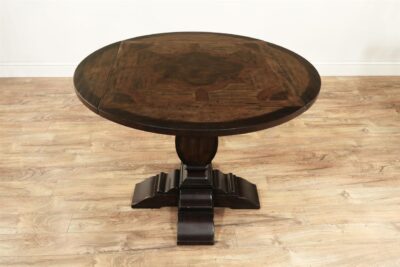 Opens to a 42-inch round accent table