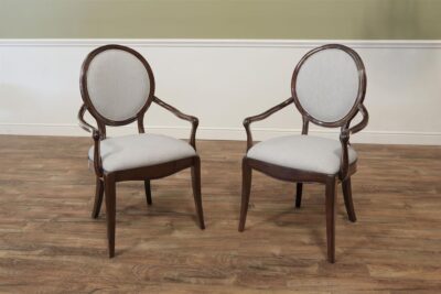 Round back mahogany dining room chairs with Neutral fabric and coordinating walnut finish