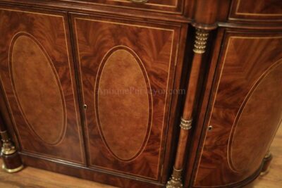 Oval walnut inlaid door panels with rosewood banded border