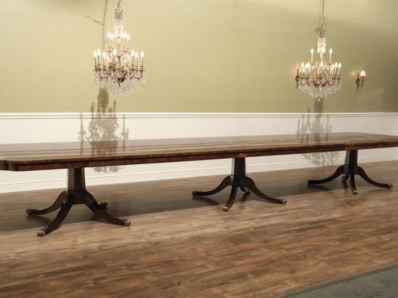 Theodore Alexander dining table shown here at 234 inches long which seats 22-24 people