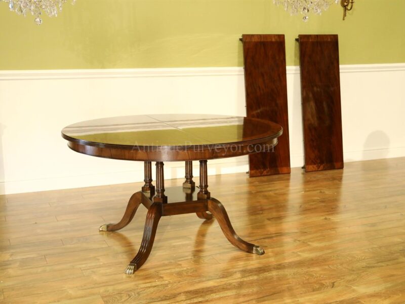 American made round to oval mahogany extension dining table