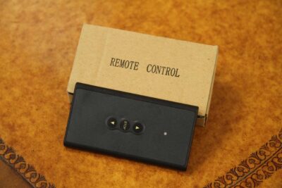 Remote control to raise and lower hidden monitor