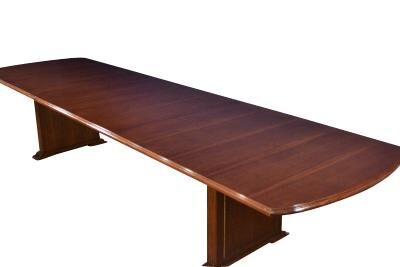 Extra long mahogany conference table extends to seat 18-20 people.