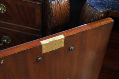 Quality brass locking hardware and well fastened drawer pulls