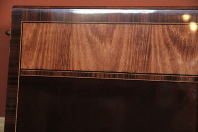 Close up details of the leaf from the expandable French Style mahogany dining table