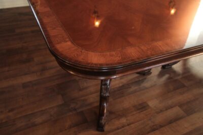 Double pedestal French Style dining table with blonde banding reeded edge and mahogany apron