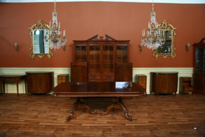 French Style mahogany dining table with mahogany apron and reeded edge