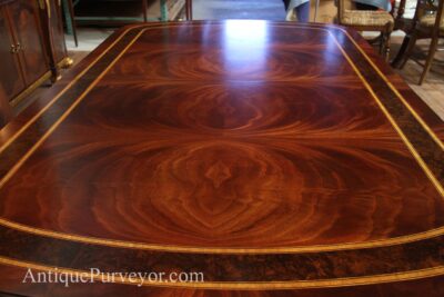 Mahogany dining table with bookmatched wide fletch Veneers