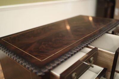 Crotch mahogany top with dark-walnut finish