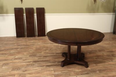 Round Solid Cherry Expandable Pedestal Table with Three Leaves- Opens to 99 inches Oval